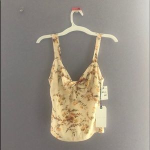 NWT floral twisted detail sweetheart top.